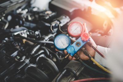 Mechanic Checking A/C Freon Levels